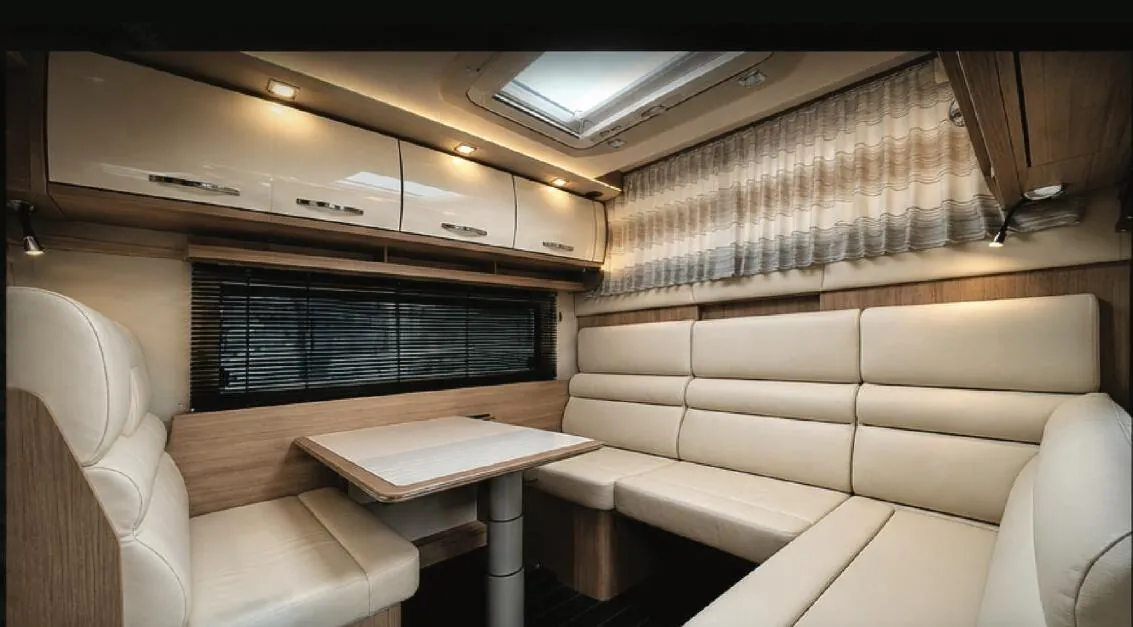 Leather dining booth and lounge inside a Leman build